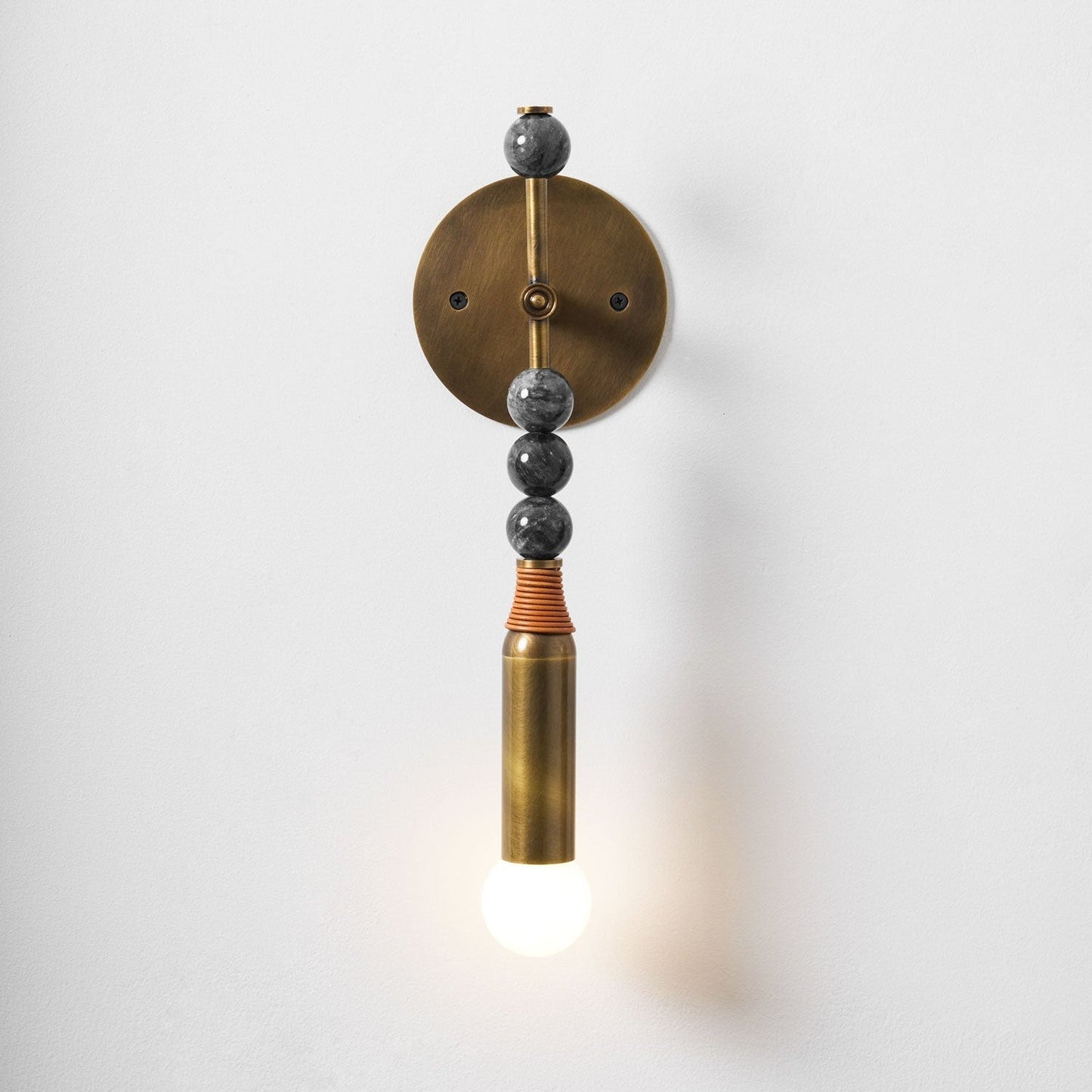 Mirathen | Sculpturale geperforeerde marmeren wandlamp